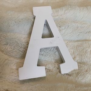 Worn in wooden letter A